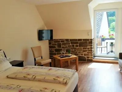 Ein Bett oder Betten in einem Zimmer der Unterkunft Landgasthof Winzerscheune