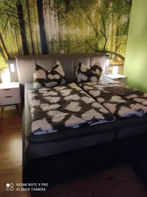 Ein Bett oder Betten in einem Zimmer der Unterkunft Gaststätte Marktstübchen