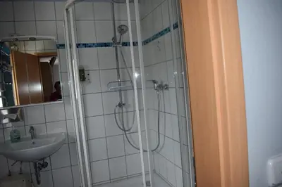 Ein Badezimmer in der Unterkunft Gaststätte Marktstübchen
