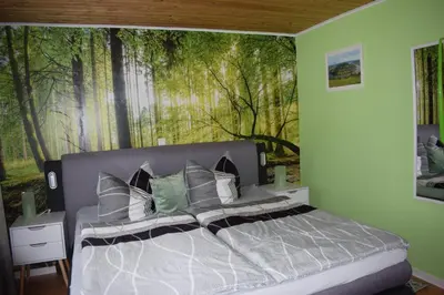 Ein Bett oder Betten in einem Zimmer der Unterkunft Gaststätte Marktstübchen