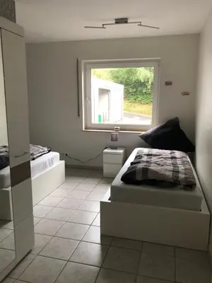 Ein Bett oder Betten in einem Zimmer der Unterkunft Ferienwohnung Zenzen