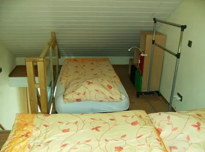 Ein Bett oder Betten in einem Zimmer der Unterkunft Järgen Ferienappartements