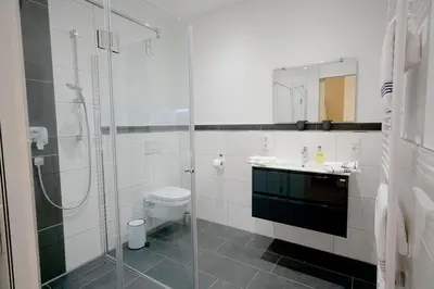 Ein Badezimmer in der Unterkunft NEU Mont Royal Suiten 2 bis 4 Personen