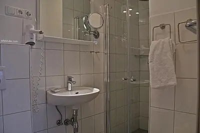 Ein Badezimmer in der Unterkunft Hotel Eifelstube