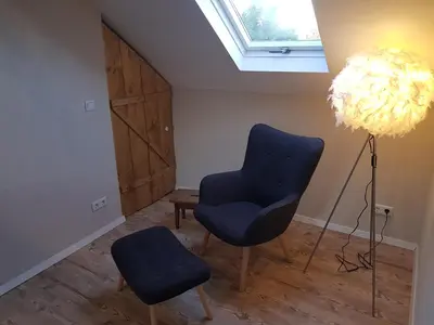 Ein Sitzbereich in der Unterkunft Altes Schreiner Haus in der Vulkaneifel