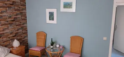 Ein Sitzbereich in der Unterkunft Gästezimmer Elly Dostert