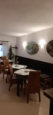 Ein Sitzbereich in der Unterkunft Gästezimmer Elly Dostert