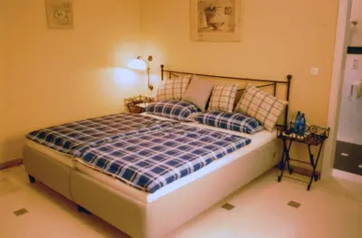 Ein Bett oder Betten in einem Zimmer der Unterkunft La Lanterna