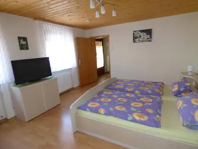 Ein Bett oder Betten in einem Zimmer der Unterkunft Ferienwohnung Dasch, bei Idar-Oberstein im Nationalpark Hunsrück-Hochwald