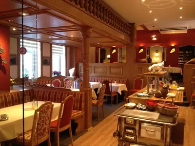 Ein Restaurant oder anderes Speiselokal in der Unterkunft Berg´s Backpacker