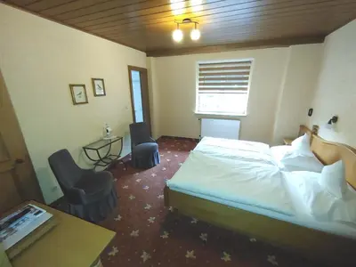 Ein Bett oder Betten in einem Zimmer der Unterkunft Berg´s Backpacker