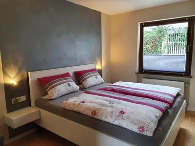 Ein Bett oder Betten in einem Zimmer der Unterkunft Haus Monika