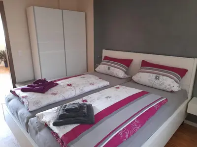 Ein Bett oder Betten in einem Zimmer der Unterkunft Haus Monika