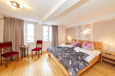 Ein Bett oder Betten in einem Zimmer der Unterkunft Ferienwohnung Altstadt