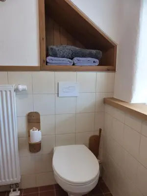 Ein Badezimmer in der Unterkunft Haus Schritte
