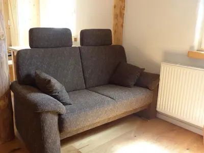 Ein Sitzbereich in der Unterkunft Apartment Schritte