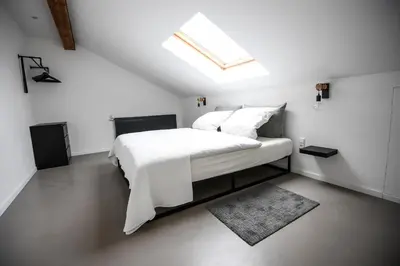 Ein Bett oder Betten in einem Zimmer der Unterkunft Zweite Heimat Nürburg