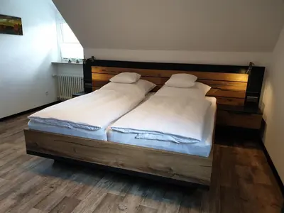 Ein Bett oder Betten in einem Zimmer der Unterkunft Rheingold