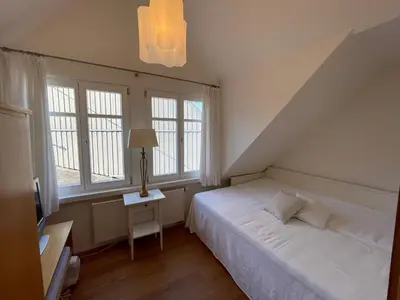 Ein Bett oder Betten in einem Zimmer der Unterkunft Landhaus am Rheinsteig & Loreley