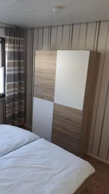 Ein Bett oder Betten in einem Zimmer der Unterkunft 4-Sterne Ferienwohnung Carbach -Perfekt für Radfahrer-