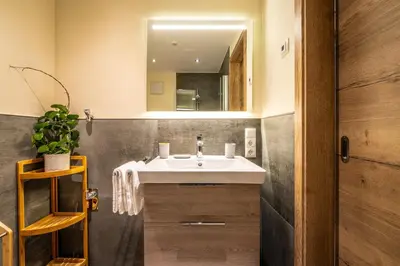 Ein Badezimmer in der Unterkunft Apart Hotel Lang