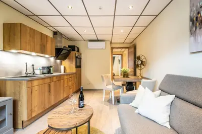 Ein Sitzbereich in der Unterkunft Apart Hotel Lang
