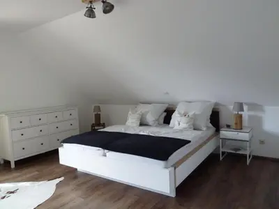 Ein Bett oder Betten in einem Zimmer der Unterkunft Schinderhanneshof