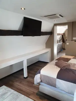 Ein Bett oder Betten in einem Zimmer der Unterkunft Das Herzchen von Cochem