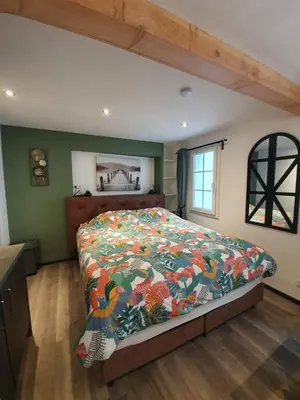 Ein Bett oder Betten in einem Zimmer der Unterkunft Das Herzchen von Cochem
