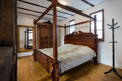 Ein Bett oder Betten in einem Zimmer der Unterkunft Rißbacher Hof anno 1737