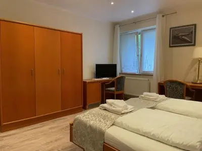 Ein Bett oder Betten in einem Zimmer der Unterkunft Landgasthof Hieren Mühle