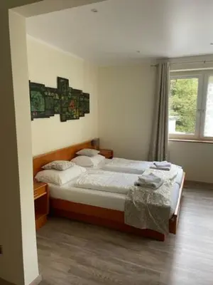 Ein Bett oder Betten in einem Zimmer der Unterkunft Landgasthof Hieren Mühle