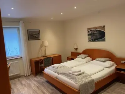 Ein Bett oder Betten in einem Zimmer der Unterkunft Landgasthof Hieren Mühle
