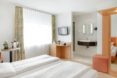 Ein Bett oder Betten in einem Zimmer der Unterkunft WohnGut Koblenz