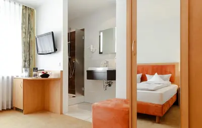 Ein Bett oder Betten in einem Zimmer der Unterkunft WohnGut Koblenz