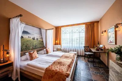 Ein Bett oder Betten in einem Zimmer der Unterkunft Hotel Weisser Bär