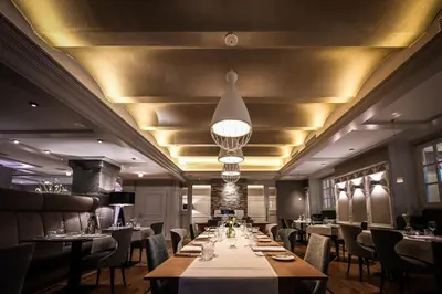 Ein Restaurant oder anderes Speiselokal in der Unterkunft Moselschlösschen Spa & Resort