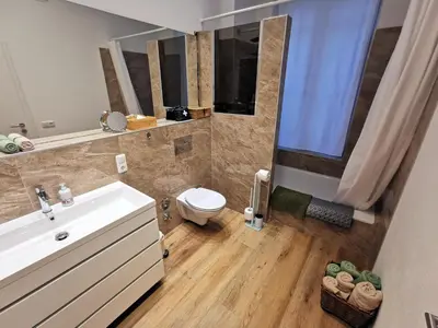 Ein Badezimmer in der Unterkunft Rheinufer am Hindenburgpark
