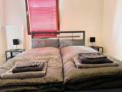Ein Bett oder Betten in einem Zimmer der Unterkunft Apartment Nürburgblick by Interhome