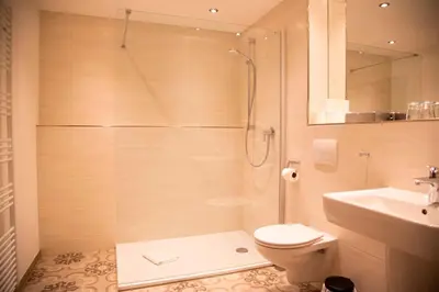 Ein Badezimmer in der Unterkunft Hotel Zum Goldenen Stern