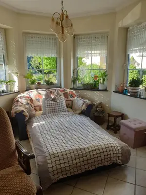 Ein Bett oder Betten in einem Zimmer der Unterkunft Ferienwohnung Thönnes