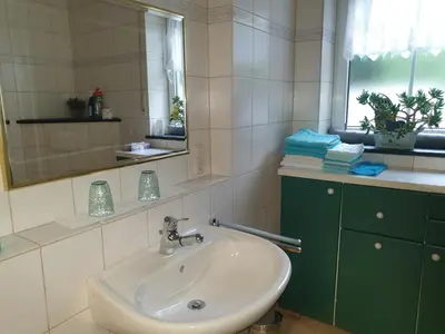 Ein Badezimmer in der Unterkunft Ferienwohnung Thönnes