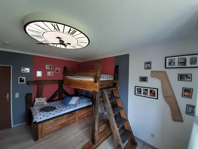 Ein Bett oder Betten in einem Zimmer der Unterkunft Ferienhaus Vulkaneifel Haus Pesch