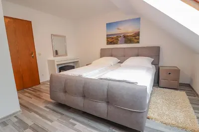 Ein Bett oder Betten in einem Zimmer der Unterkunft Ferienwohnung Bad Bertrich