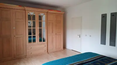Ein Bett oder Betten in einem Zimmer der Unterkunft Dolce Vita Gerolstein - Luca