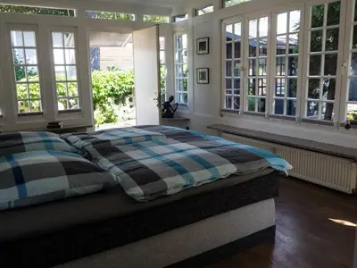 Ein Bett oder Betten in einem Zimmer der Unterkunft Ferienwohnung am Rheinsteig
