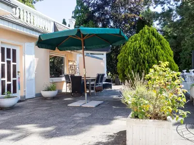 Ein Garten an der Unterkunft Ferienwohnung am Rheinsteig