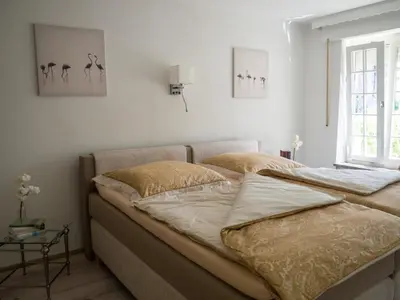 Ein Bett oder Betten in einem Zimmer der Unterkunft Ferienwohnung am Rheinsteig