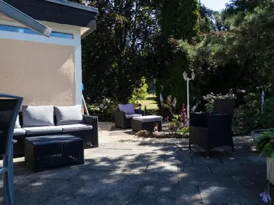 Ein Garten an der Unterkunft Ferienwohnung am Rheinsteig