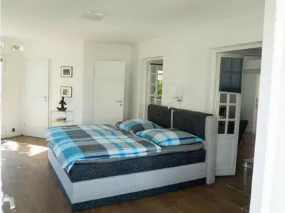 Ein Bett oder Betten in einem Zimmer der Unterkunft Ferienwohnung am Rheinsteig